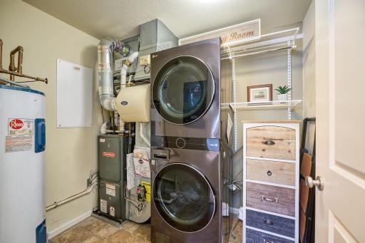 In-home laundry room also provides space for extra storage.