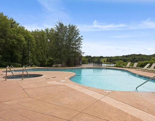 Outdoor pool and hot tub overlooking Lake Jonathan
