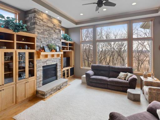 Soaring windows in the great room offer beautiful views of the backyard and wetland...filled with wildlife!