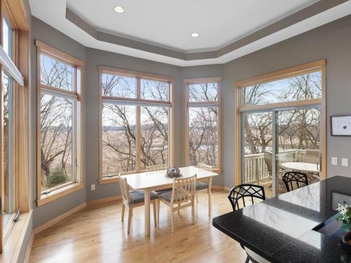 Informal dining area is filled with natural light and offers views, views, VIEWS!