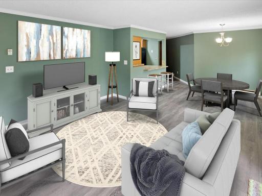 Open floor plan with LVP - walks out to spacious green space.