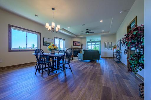 LVT flooring is featured throughout the open concept main living areas.