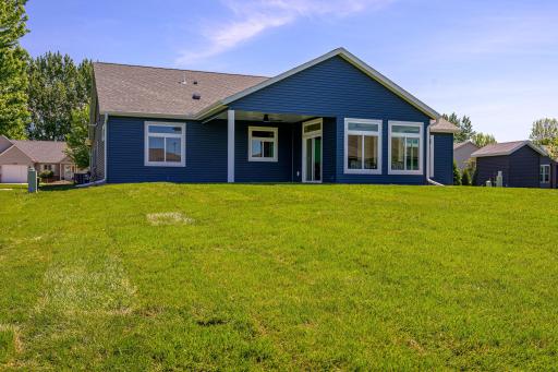 The backyard features a relaxing covered rear porch.