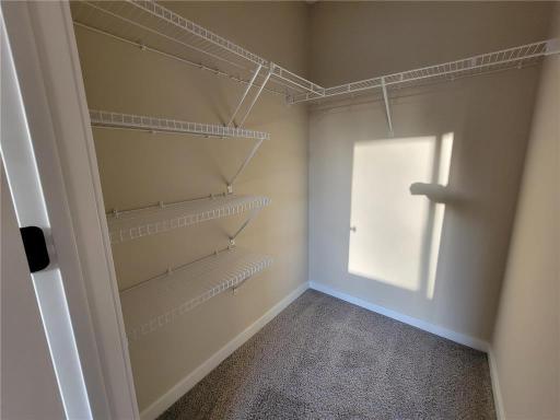Alt Primary Walk-In Closet (*not exact home pictured. Photos depict similar home following the Princeton B plan).