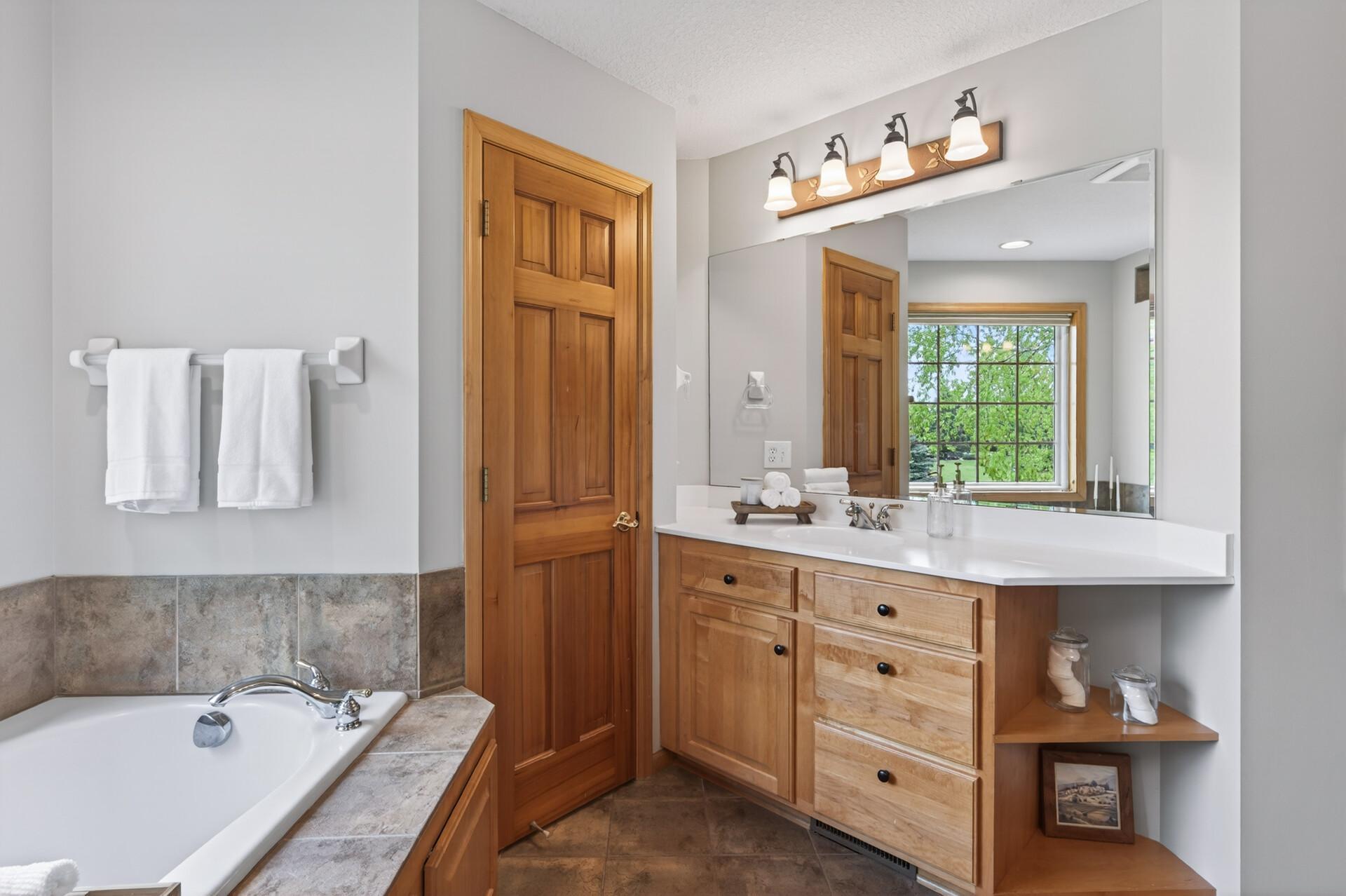 View of sink near water closet (toilet room)