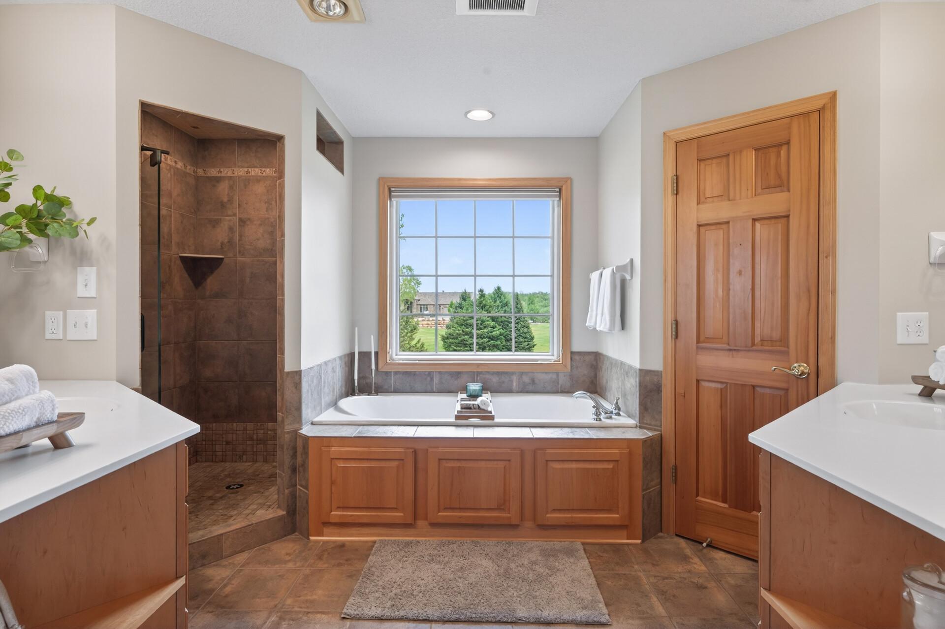 Jetted tub and tile shower