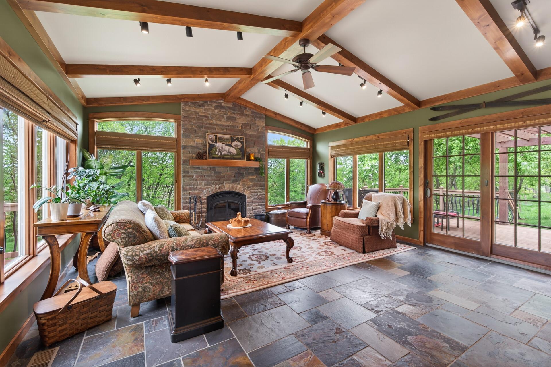 Window lined walls in the Sun/Hearth room