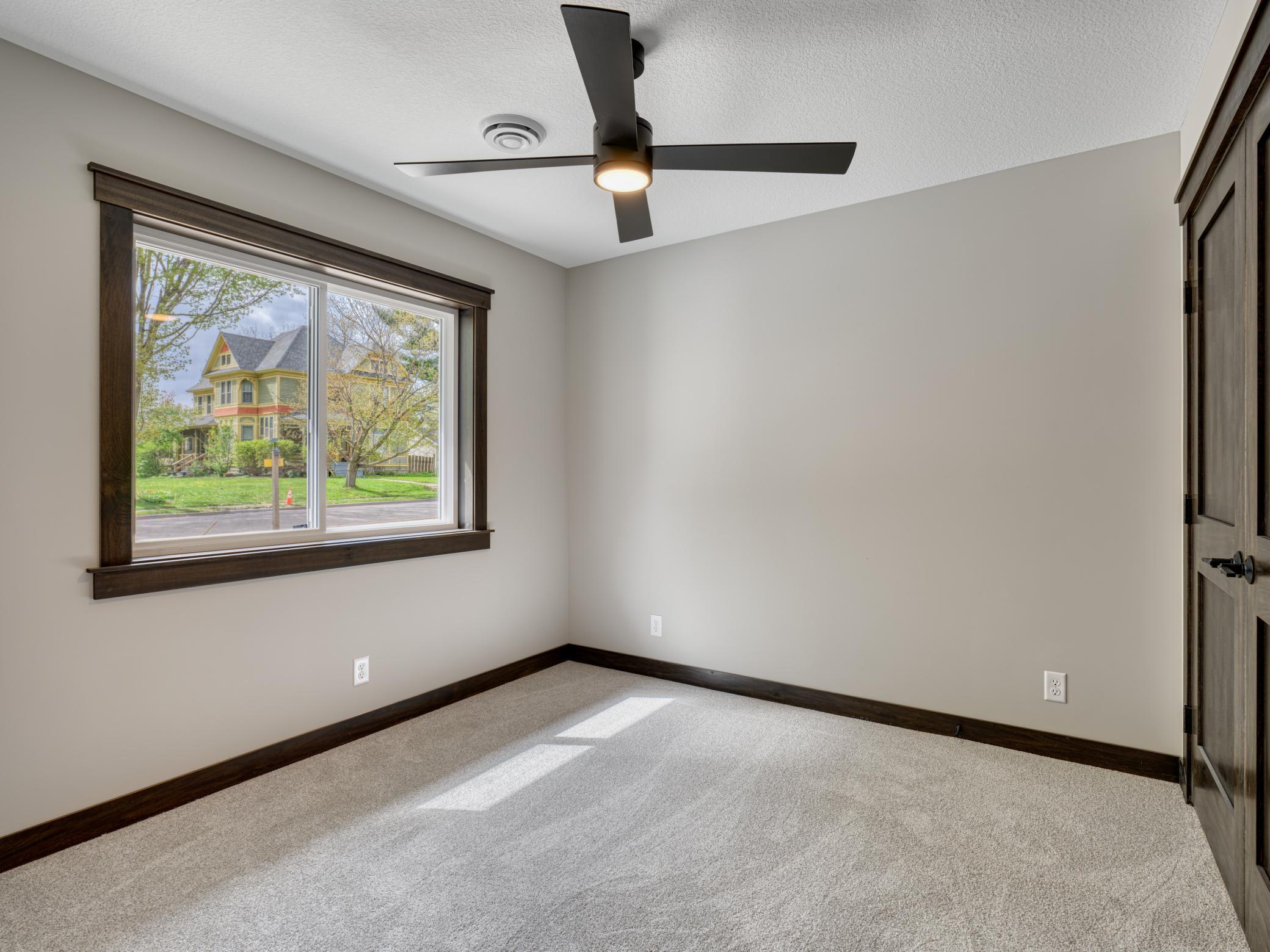 9 - 234 Bedroom 1 - nicely-sized closets and sleek ceiling fan