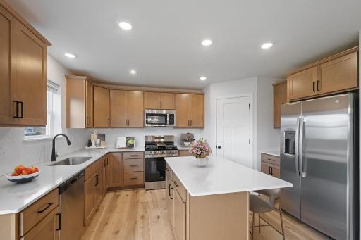Kitchen of similar floorplan. Selections and finishes will vary. Virtually staged.