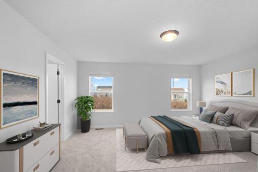 Owner's bedroom. Photo of similar home. Selections and finishes will vary. Virtually staged.