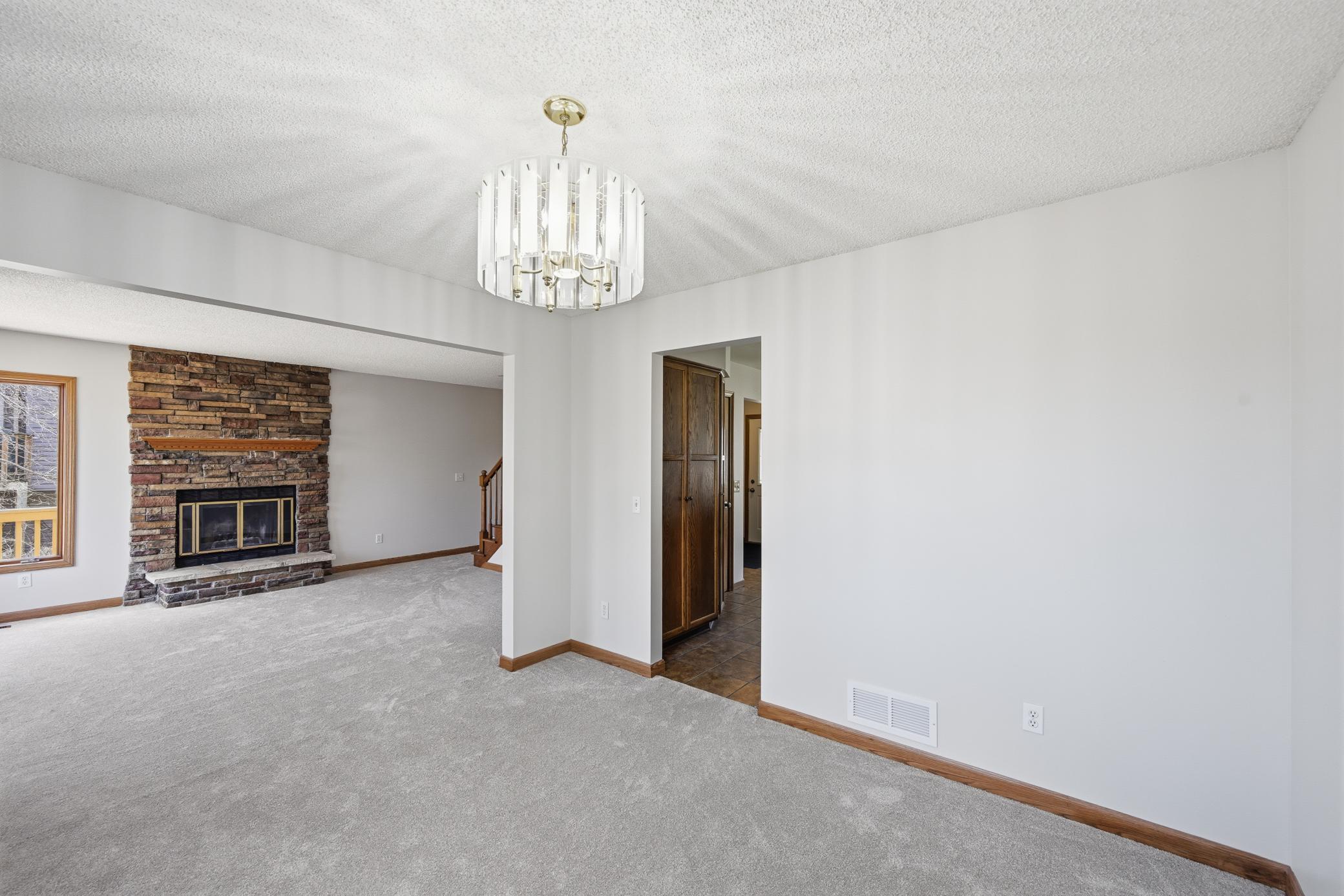 The open-concept kitchen and dining area make entertaining easy and provide a seamless flow to the living room.