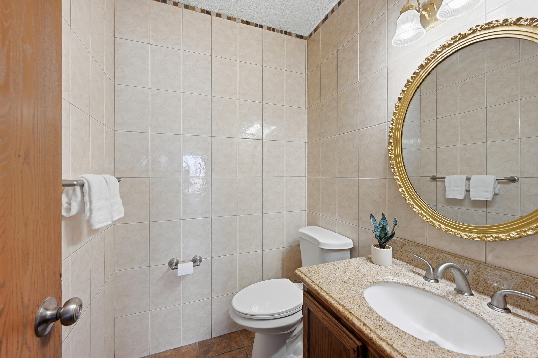 1/2 bath for guests located on the main level.