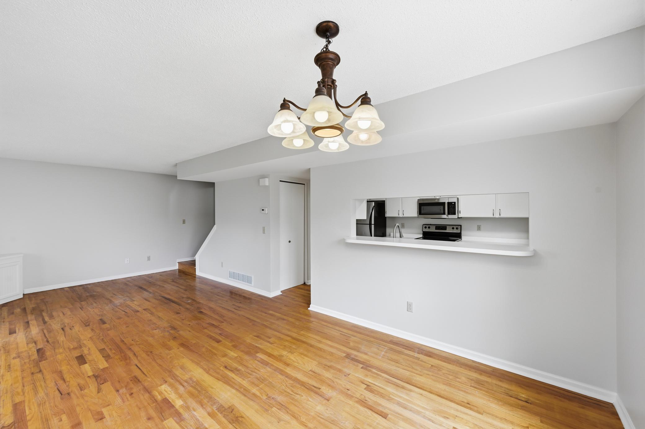 Convenient passthrough to kitchen makes serving dinner a breeze.