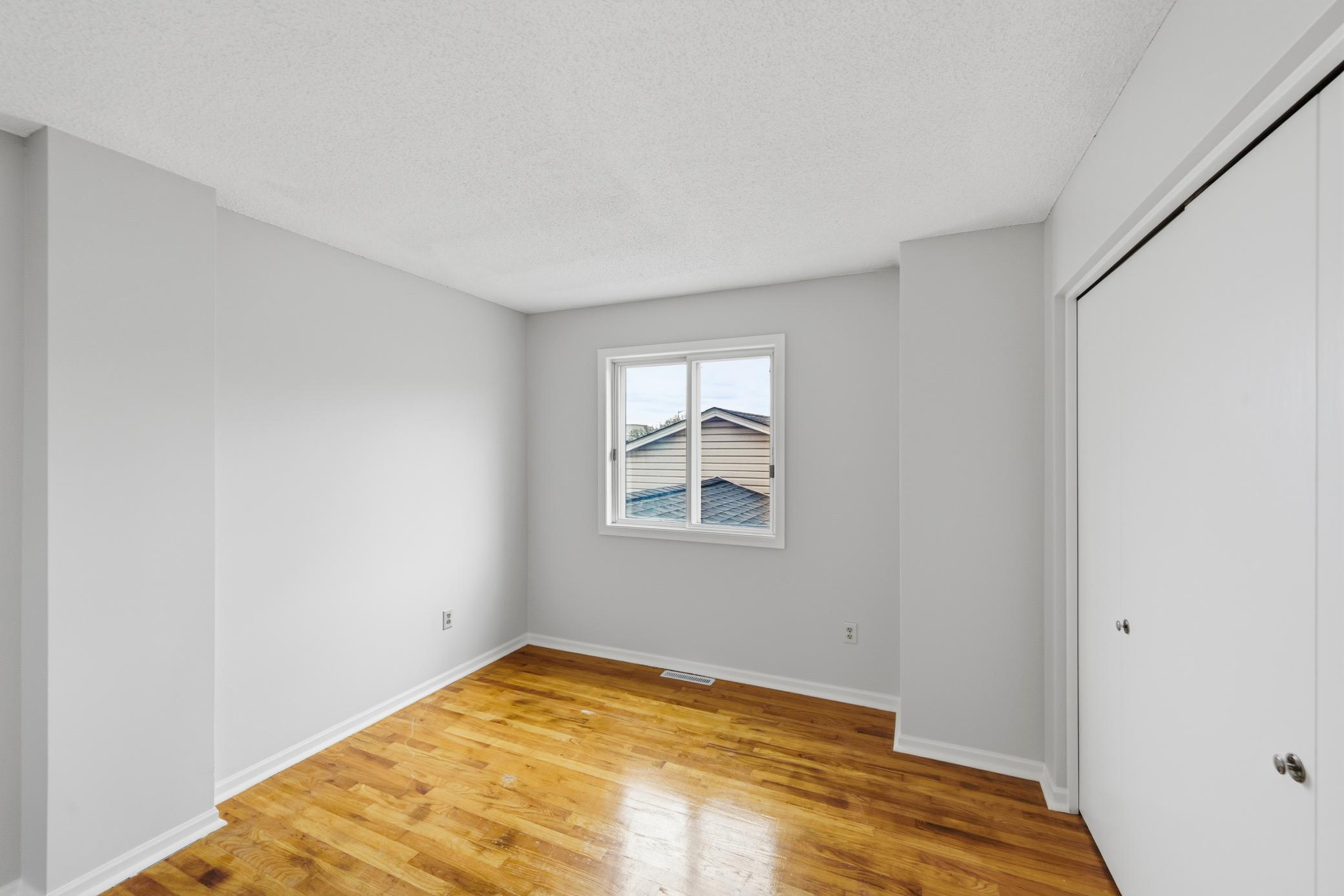Third upper level bedroom.