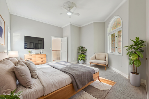 The third bedroom boasts windows facing both north and south, bathing the room in warm afternoon light. It also provides direct access to the bonus room above the garage.