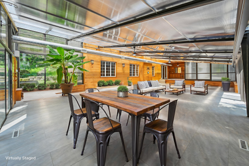 Brimming with natural light, this versatile recreation room adapts to your lifestyleâperfect as a billiards room, gaming lounge, greenhouse, yoga studio, or even converted back into an indoor pool. A space that must be seen to be fully appreciated.