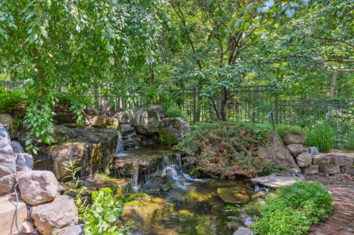 This is the largest and most striking of the four water features on the property. Close your eyes and let the soothing sound of water cascading over rocks, paired with birdsong, transport you to a tropical paradise.