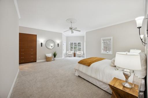 The ownerâs suite features a spacious sleeping area with a cozy reading nook overlooking the bluffs of the St. Croix River. A stunning built-in black walnut dresser maximizes space while minimizing the need for additional furniture.