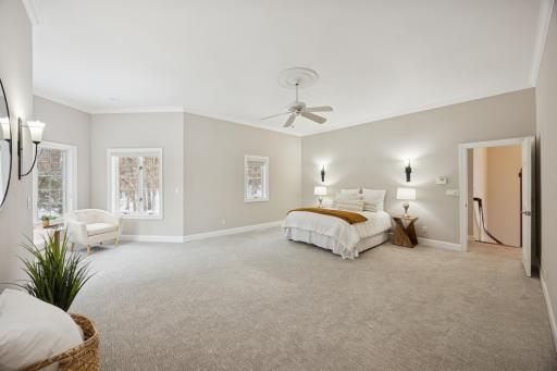 At the top of the stairs, youâre welcomed into the ownerâs suite. Featuring new carpet and fresh paint, the space is both inviting and filled with natural light.