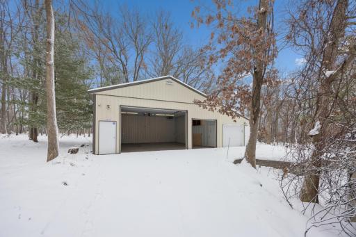 Need more storage - the pole building has you covered! Divided into two sections, the larger area is insulated & heated, has a concrete floor and two overhead doors. The second section also has a concrete floor and a 7-foot door, ideal for equipment.