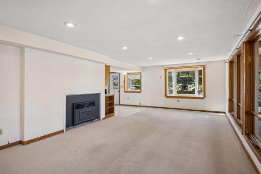The living room with a view of the dining area.