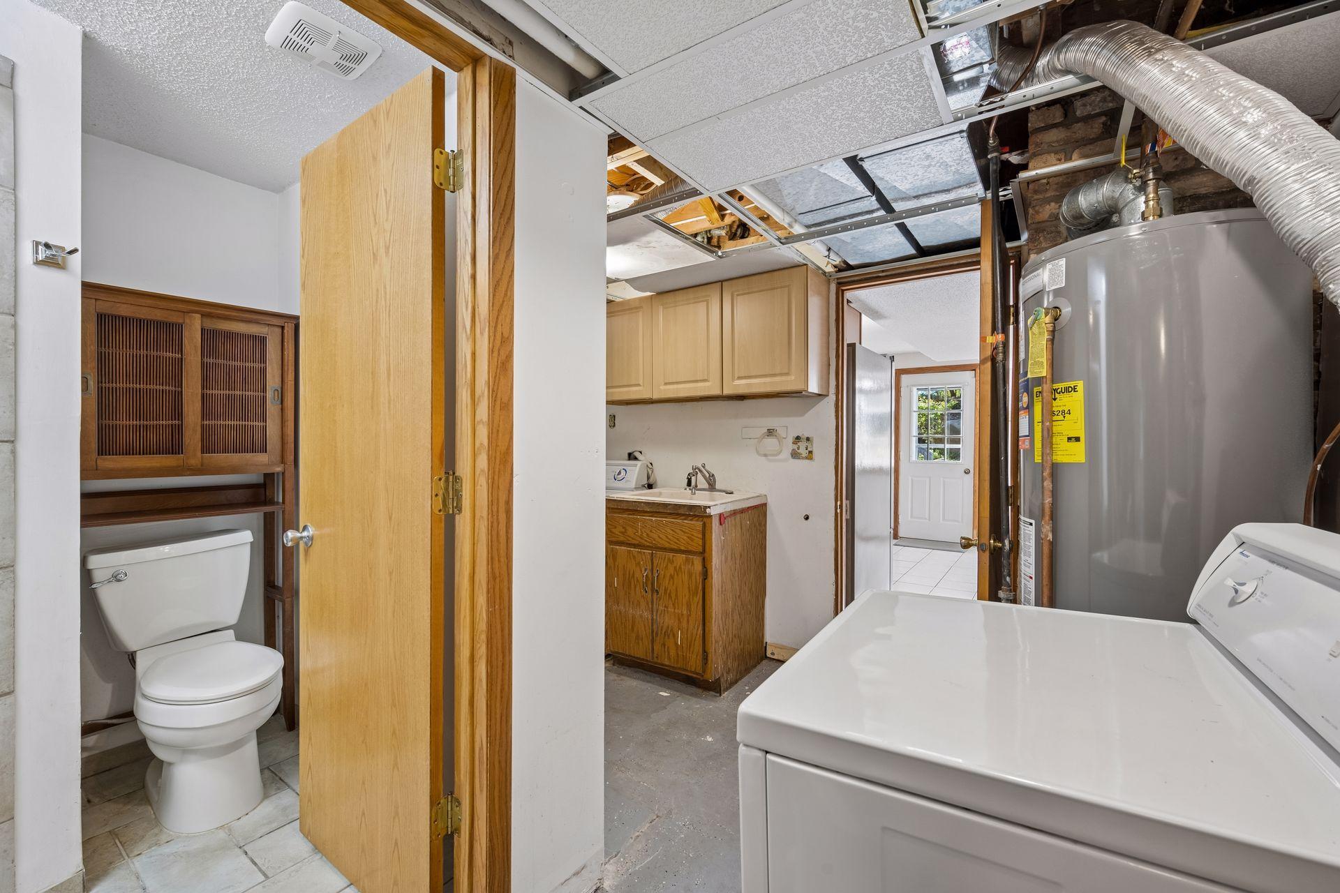 In the lower level are the utilities, the laundry and the 3/4 bath.