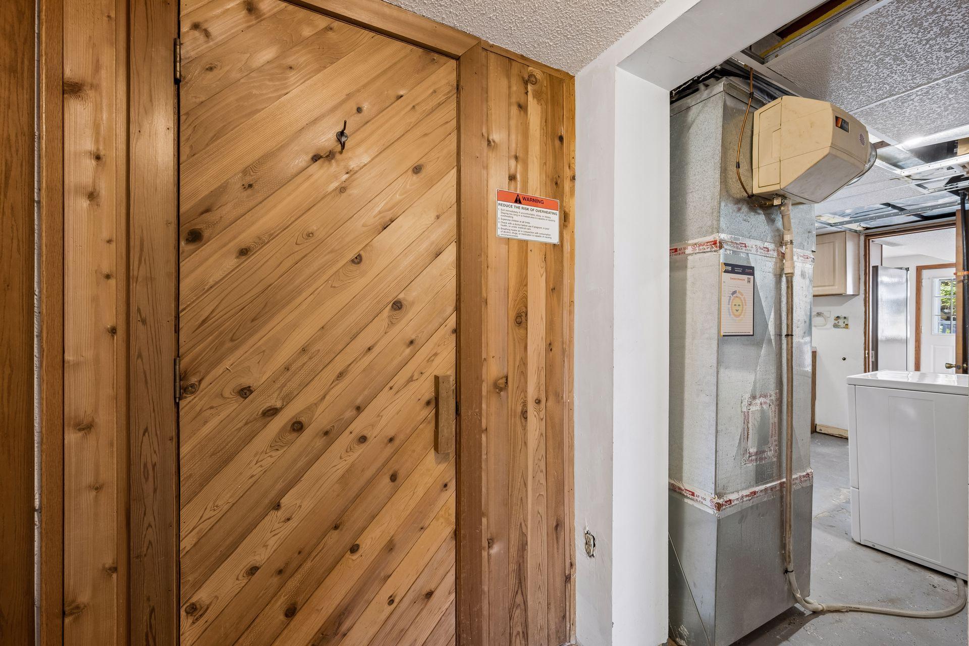 An tucked away in the lower level is a sauna.