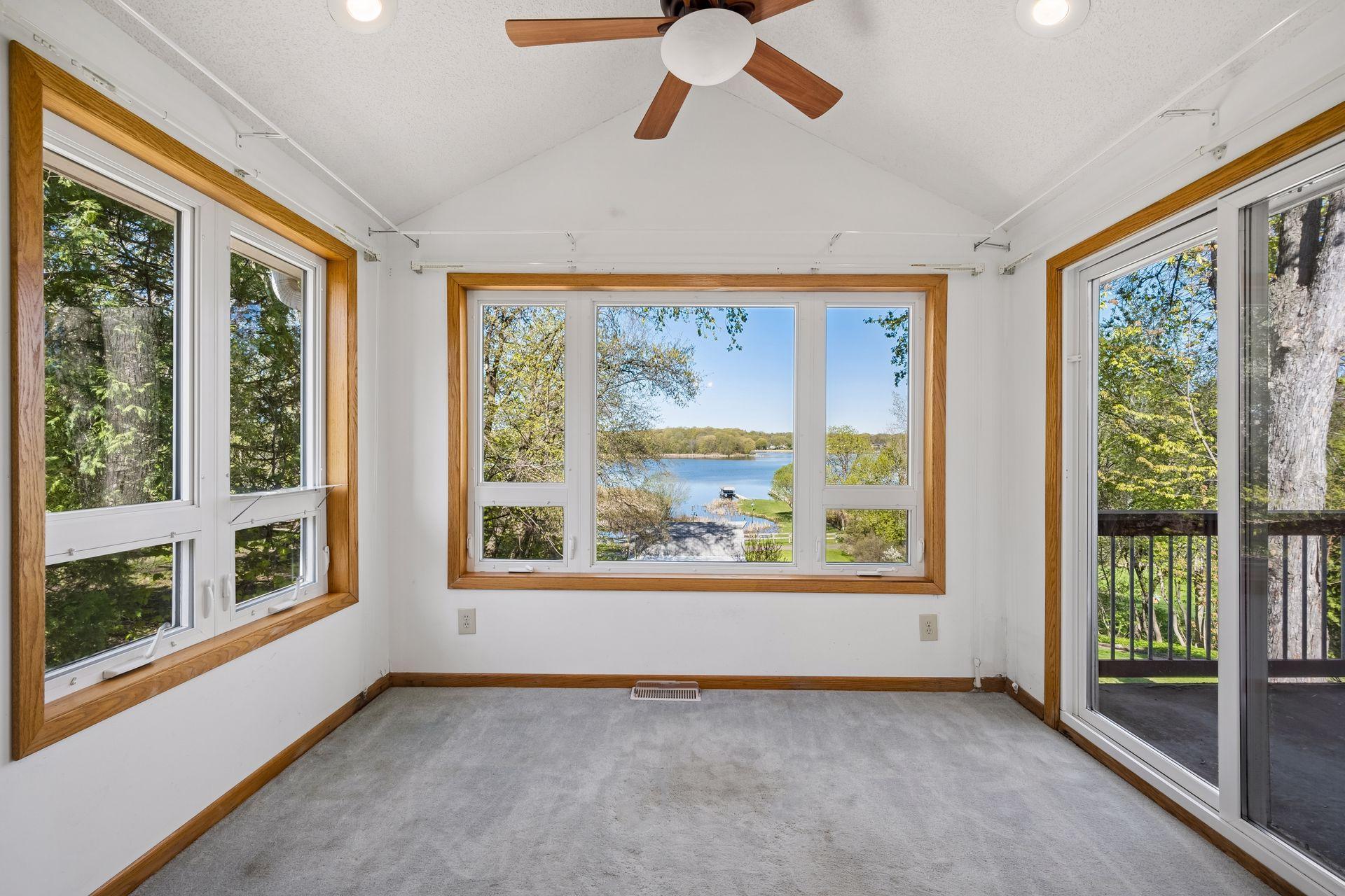 The primary bedroom has its own sunroom and deck area to enjoy.