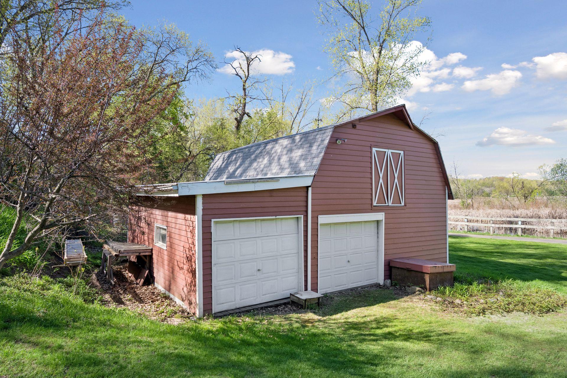 A barn, and then some. Loads of storage for all your tools and boat toys.