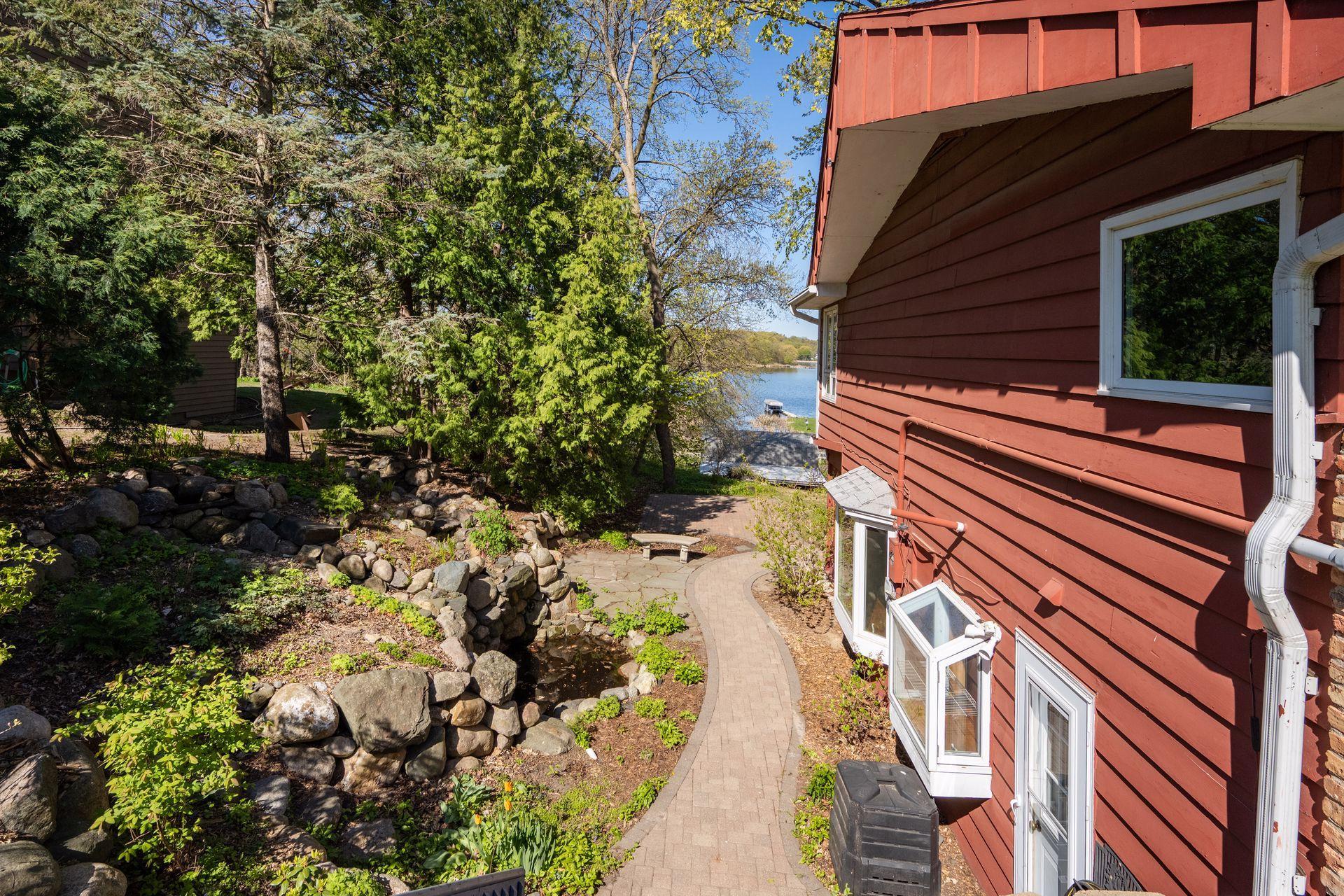 A side view of the home to the water.