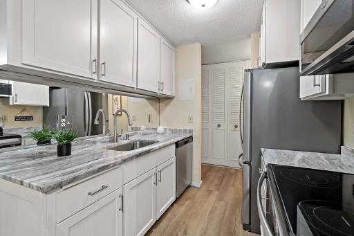 Kitchen view to Front entry. 2800 Hamline Ave N Roseville MN Unit 112_0020.jpg