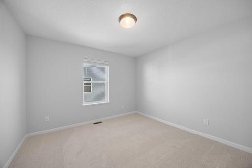 Bedroom 2. Photo of the same floorplan in a different community.
