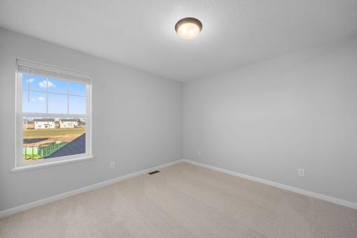 Bedroom 3. Photo of the same floorplan in a different community.