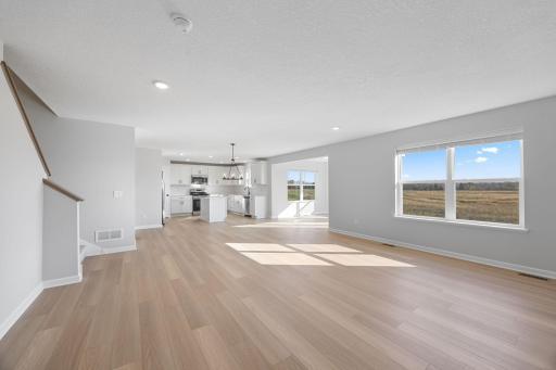 Family room. Photo of the same floorplan in a different community.