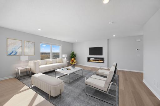HUGE family room. Virtually staged. Photo of the same floorplan in a different community.
