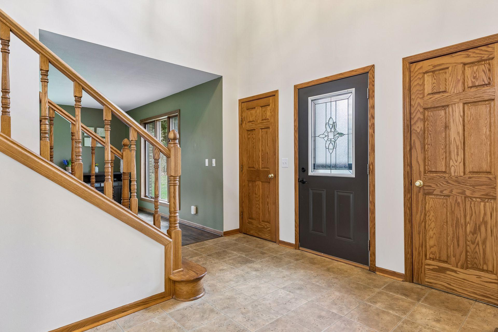 Welcoming entryway with beautiful wood details