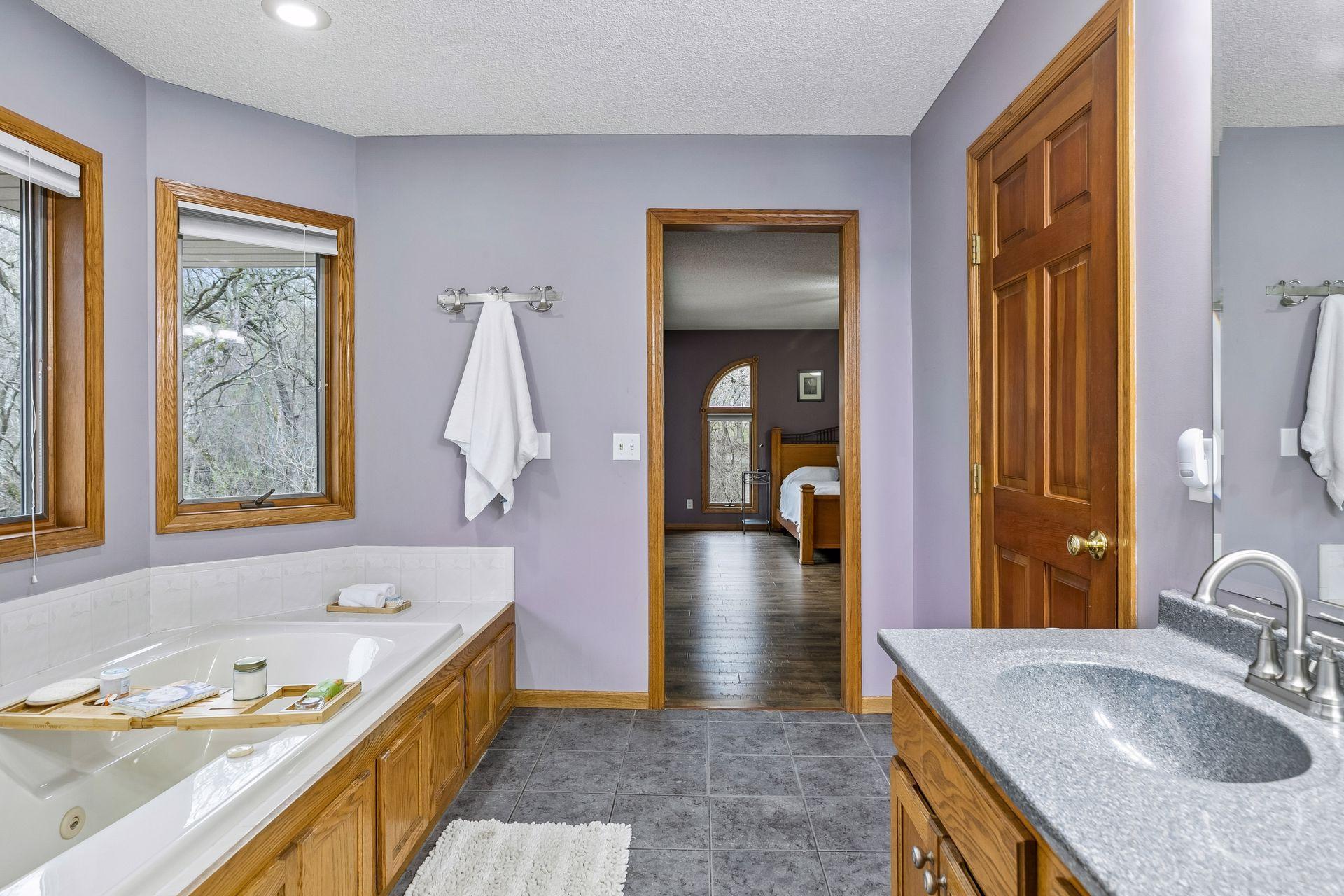 Unwind in this serene, spacious bathroom