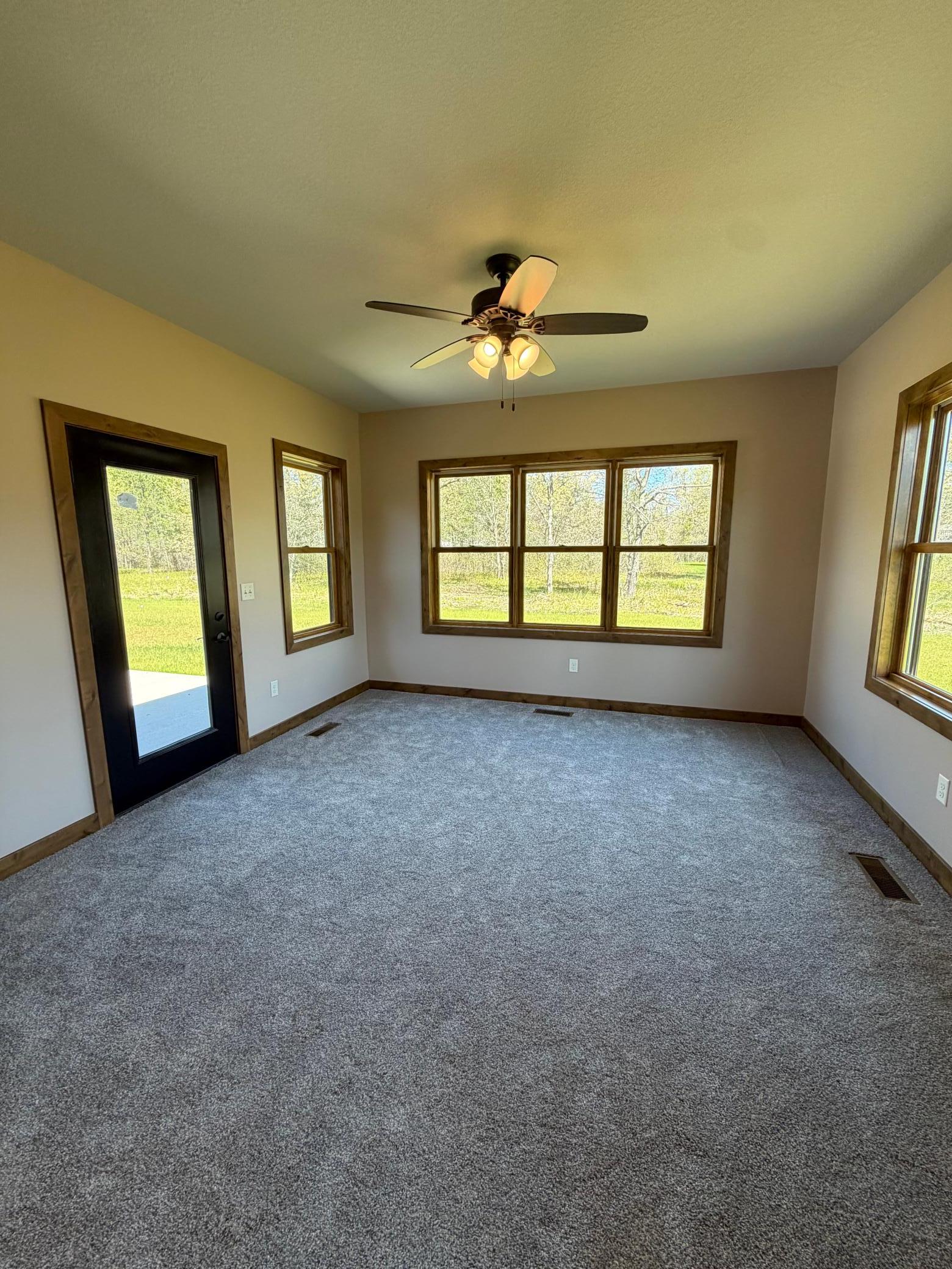 Sunroom lets in tons of natural light!!
