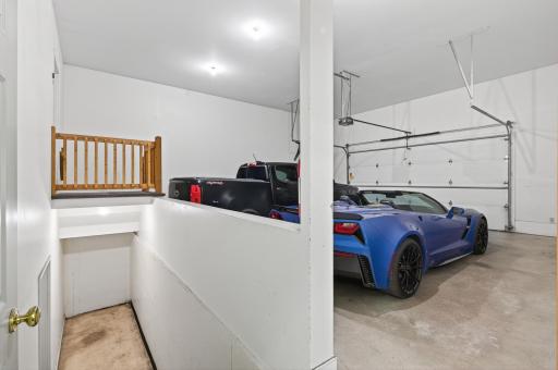 Dream Garage features 13 foot ceilings and over 7 garage stalls. Front 2 Garage Stalls pictured here