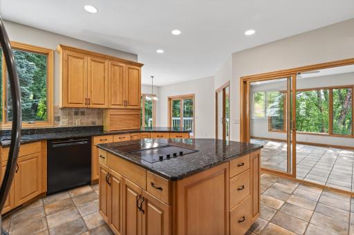 Kitchen opens up to Informal Dining Area and Sun Room