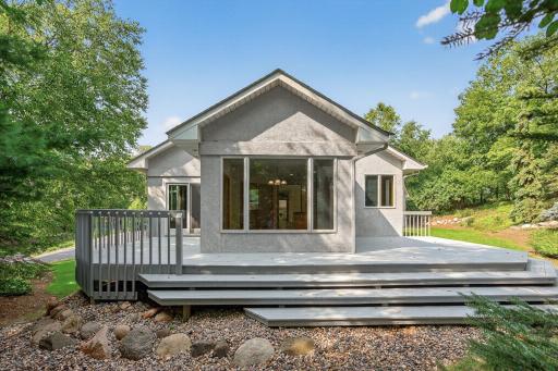 Wrap-around Deck connects to both the Sun Room and the Informal Dining Area