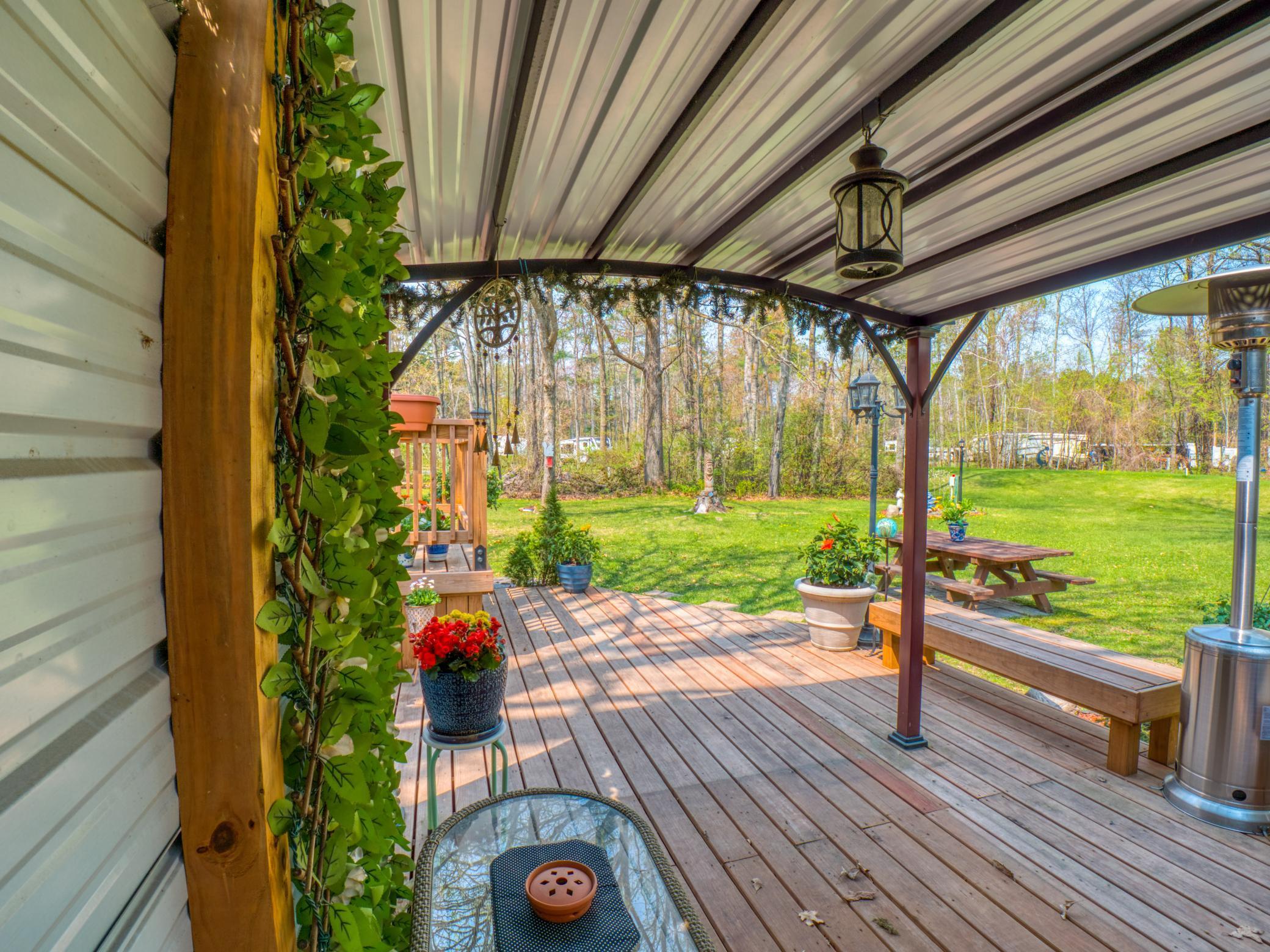 Off of the main house is this cozy patio/porch