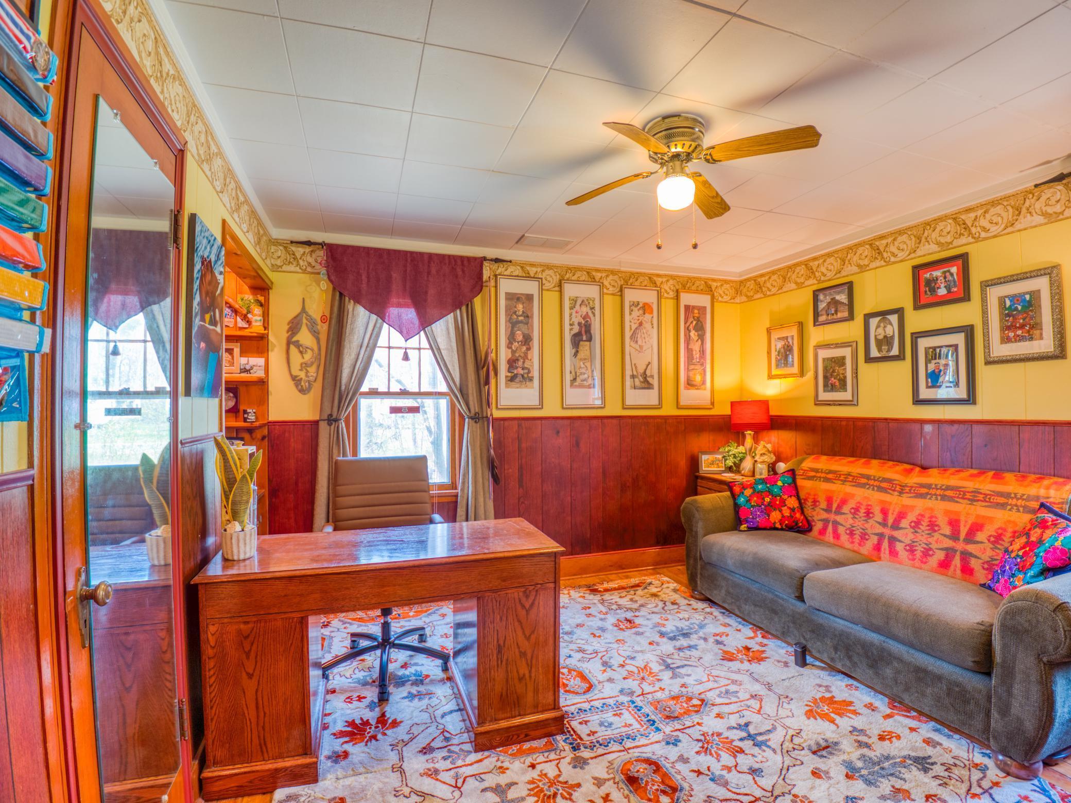 main floor bedroom or office main home.jpg