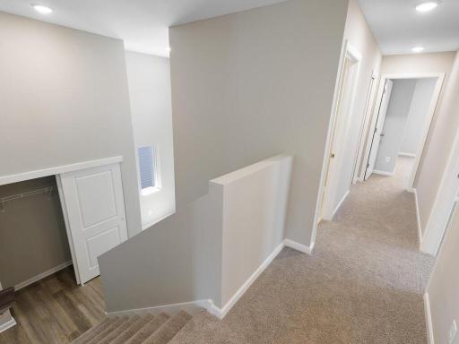 Photo of a different home with similar plan & finishes. Foyer features a larger closet. Photo may not depict actual plan & finishes.