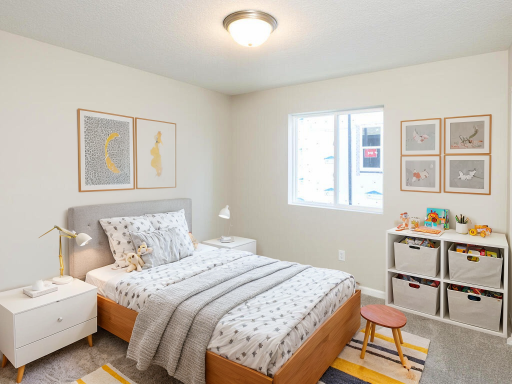 Photo of a different home with similar plan & finishes virtually staged. Bedroom 3. Photo may not depict actual plan & finishes.