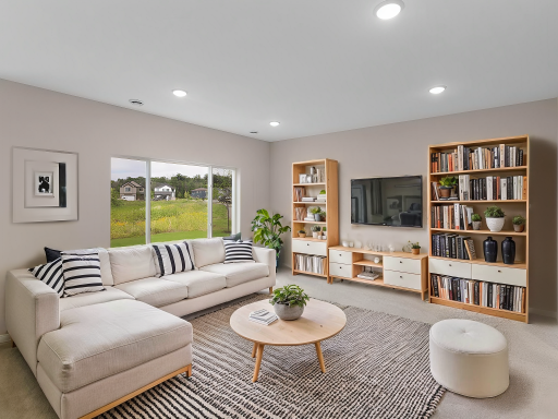 Living Room, Virtually Staged. Photo taken of another home with similar plan and finishes. Photos and renderings may not depict actual plan, materials, & finishes may vary. All measurements are approximate.