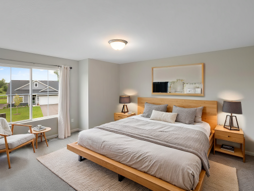 Primary Suite, Virtually Staged. Photo taken of another home with similar plan and finishes. Photos and renderings may not depict actual plan, materials, & finishes may vary. All measurements are approximate.