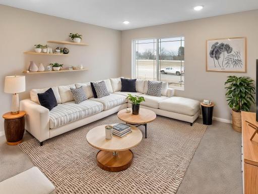 Living Room, Virtually Staged. Photo is taken of another home with similar plan and finishes.
