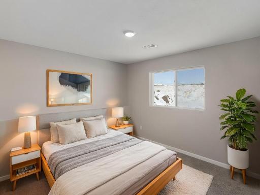 Lower Level Finished Bedroom 3, Virtually Staged. Photo is taken of another home with similar plan and finishes.