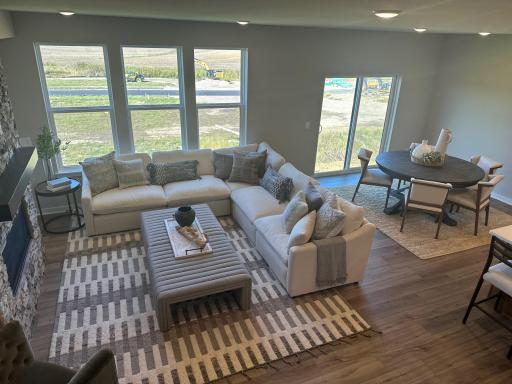 Open floorplan creates a seamless connection between the family room, kitchen, and dining areas—ideal for entertaining and family togetherness.